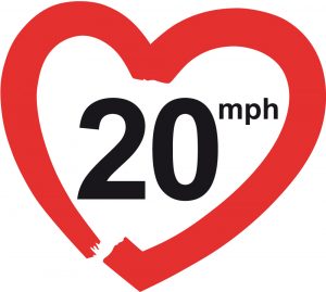 red heart shape with 20 mph written inide - dsigned to resemble speed limit sign